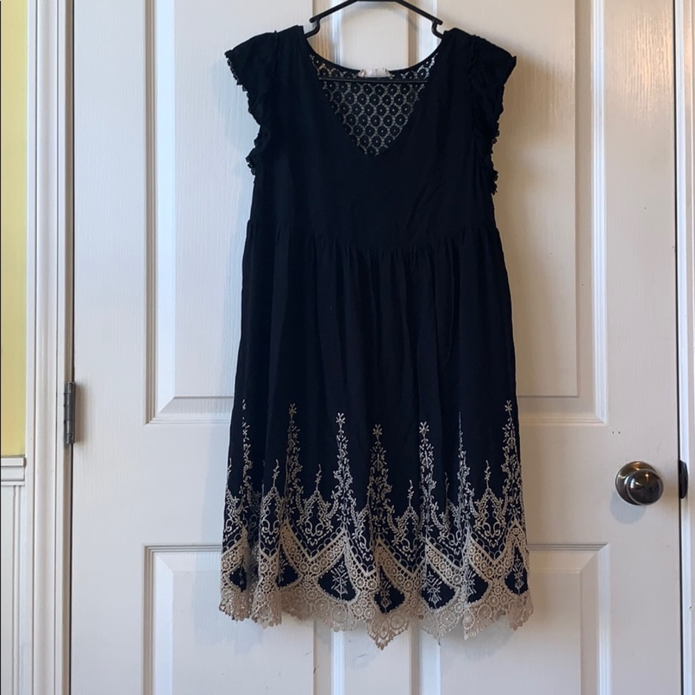 long black dress with details and designs
